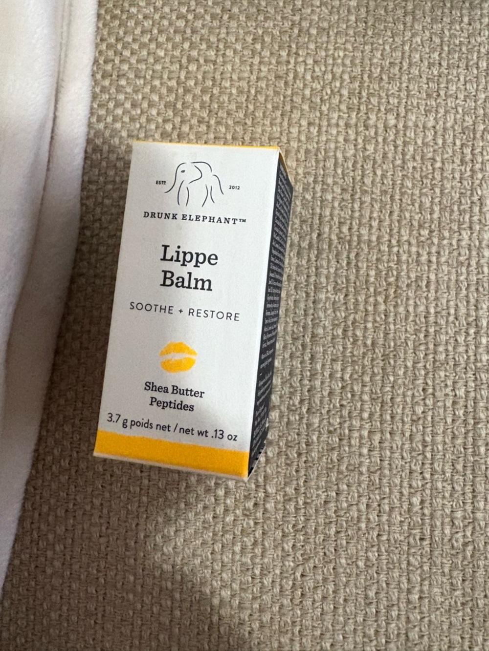 Drunk Elephant Lippe Balm in White and Yellow Box